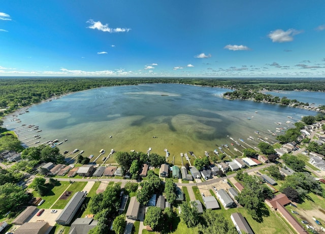 bird's eye view featuring a water view and a residential view