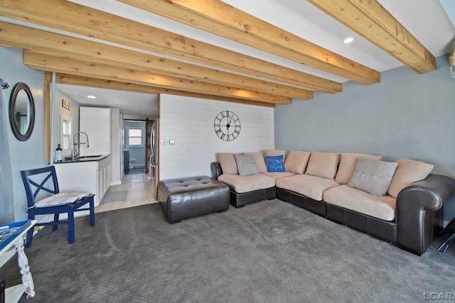 living room with carpet, beamed ceiling, and recessed lighting