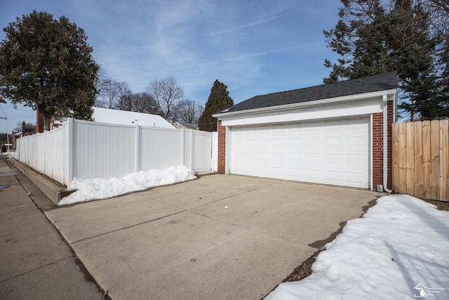 detached garage with fence