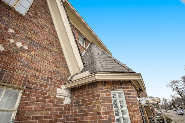 16636 Sorrento St, Detroit, MI 48235 - view of home's exterior featuring brick siding and a shingled roof