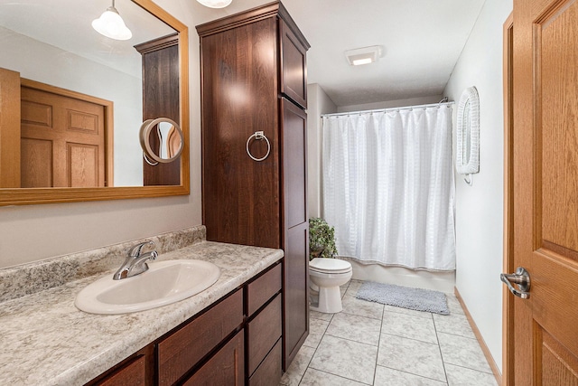 bathroom with toilet, tile patterned flooring, shower / bath combo, and vanity