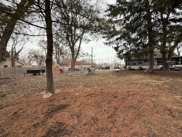 view of yard with fence