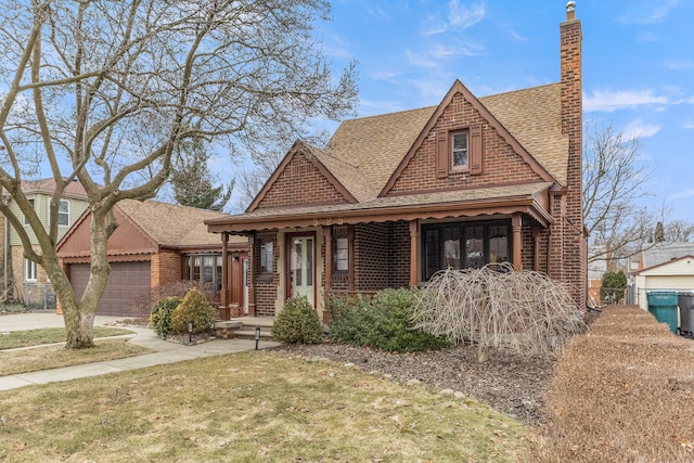 view of front of property with a garage, roof with shingles, brick siding, and a chimney