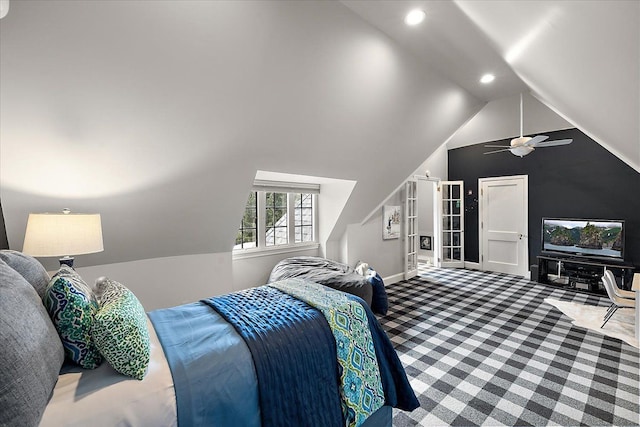 carpeted bedroom featuring a ceiling fan, recessed lighting, and vaulted ceiling