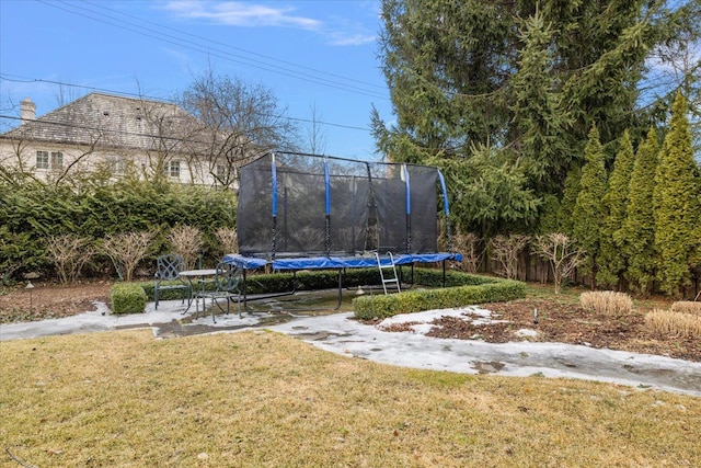 view of yard with a trampoline