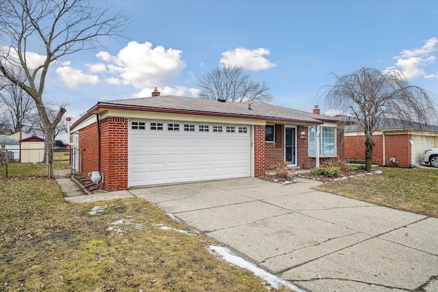 single story home with concrete driveway, a chimney, an attached garage, fence, and brick siding