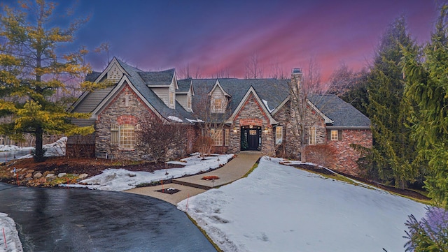 view of front of house with stone siding