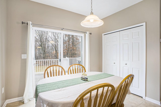 dining room with baseboards