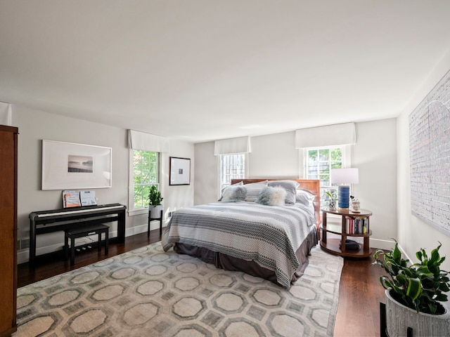 300 Warren Ct, Birmingham, MI 48009 - bedroom featuring wood finished floors, multiple windows, and baseboards