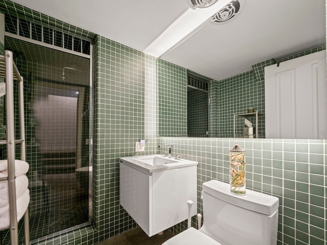 300 Warren Ct, Birmingham, MI 48009 - bathroom featuring tile walls, a stall shower, toilet, vanity, and tile patterned floors