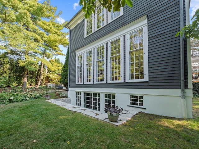 300 Warren Ct, Birmingham, MI 48009 - view of home's exterior featuring a lawn