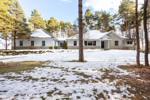 view of front of house with stone siding