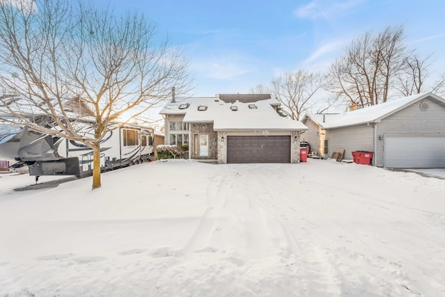 view of front of property with a garage