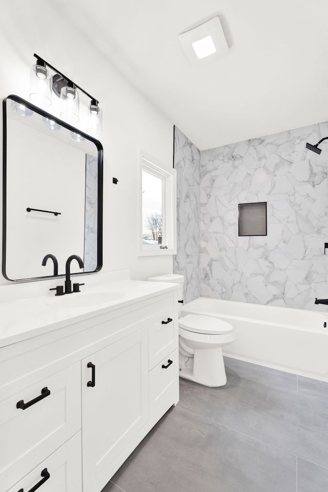 bathroom featuring vanity, toilet, and shower / bathtub combination