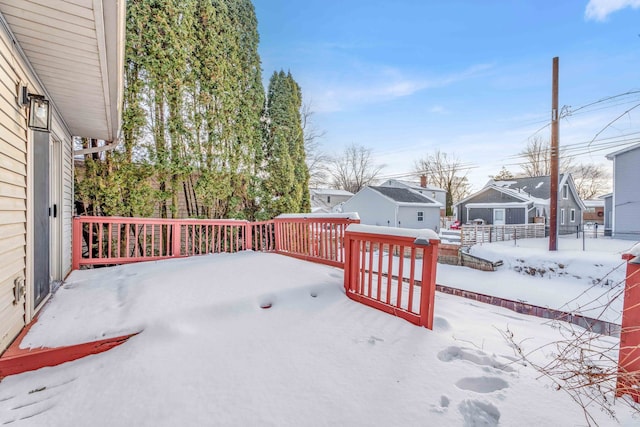 view of snow covered deck