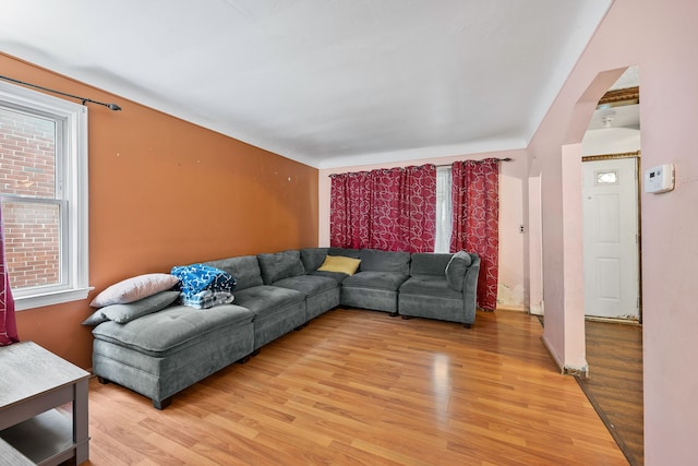 living area featuring light wood-style floors and plenty of natural light