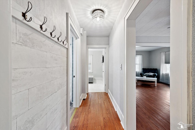 hall featuring wood finished floors