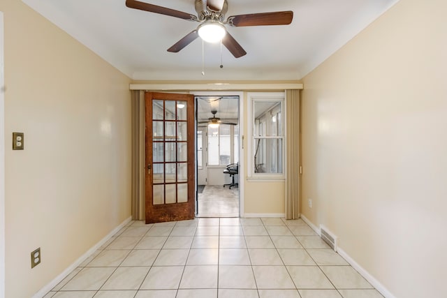 entryway featuring french doors, visible vents, baseboards, and light tile patterned floors