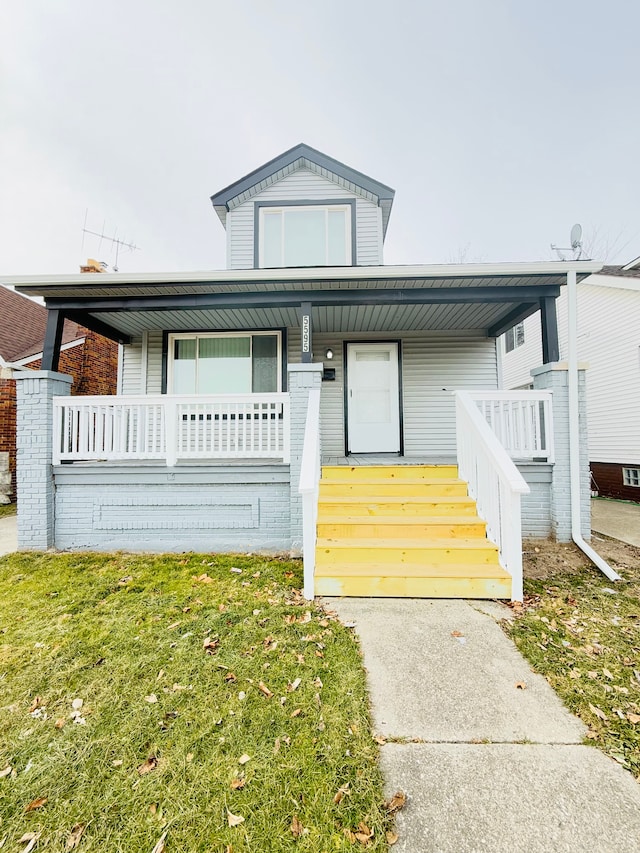 bungalow-style home with a porch