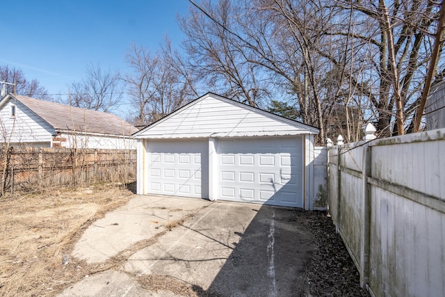 detached garage with fence