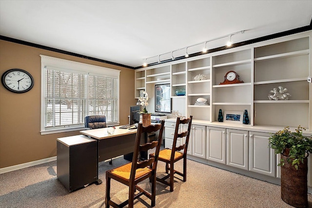 home office featuring ornamental molding and baseboards