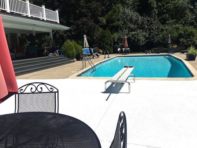 pool featuring a patio