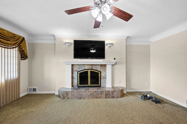 unfurnished living room featuring baseboards, visible vents, carpet floors, ornamental molding, and a tiled fireplace