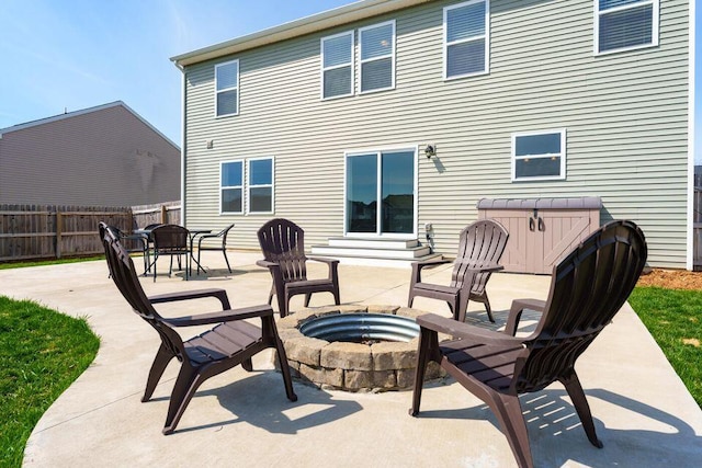 view of patio featuring entry steps and fence