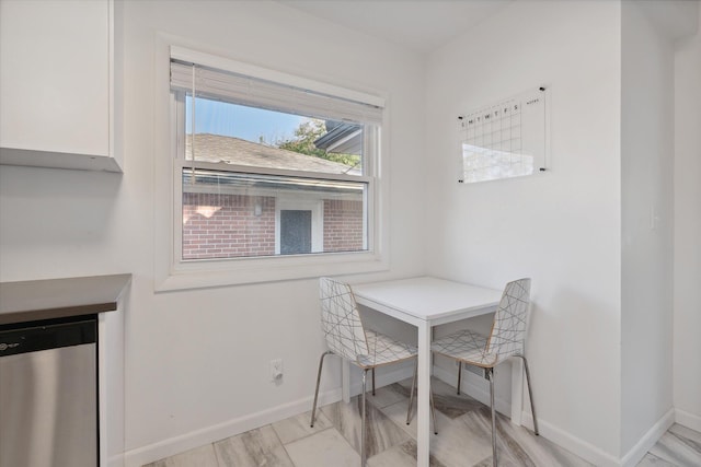 dining room with baseboards