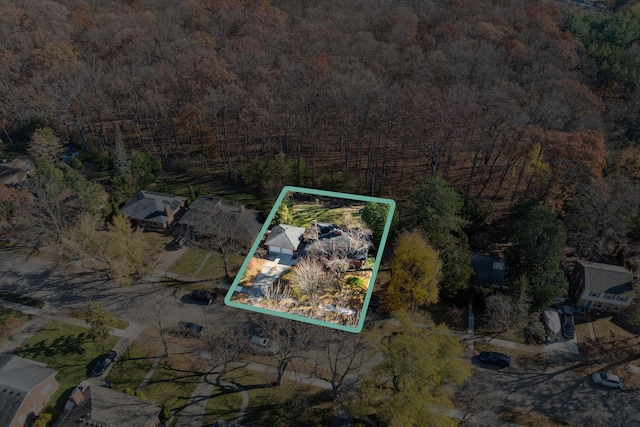 drone / aerial view with a view of trees