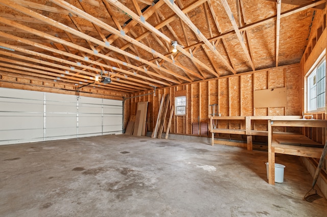 garage featuring a garage door opener