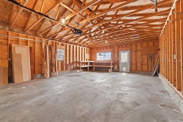 miscellaneous room featuring a garage and concrete flooring