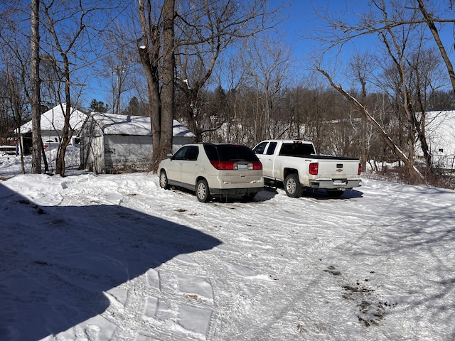 view of yard layered in snow