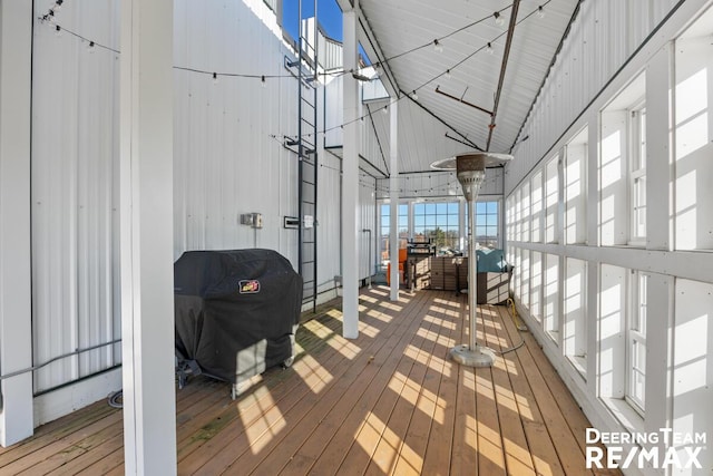 wooden deck featuring grilling area