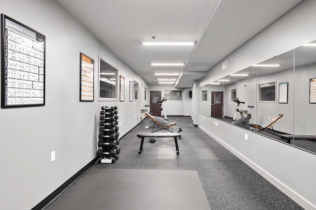 exercise area with baseboards