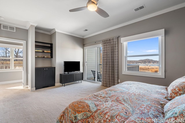 carpeted bedroom with access to outside, ornamental molding, visible vents, and baseboards