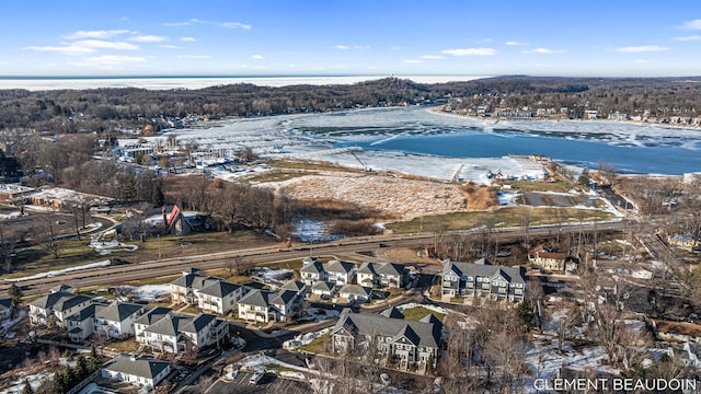 aerial view with a residential view and a water view