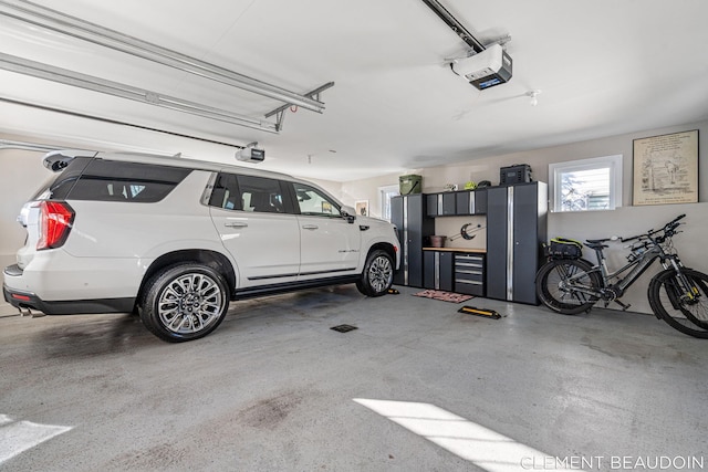 garage featuring a garage door opener