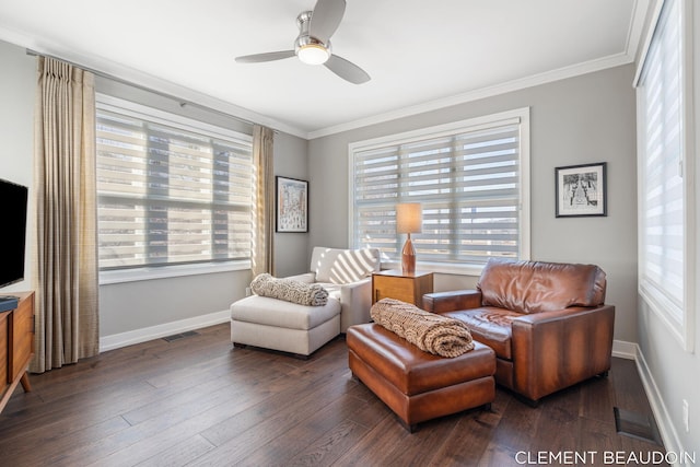 living area featuring ornamental molding, wood finished floors, and visible vents