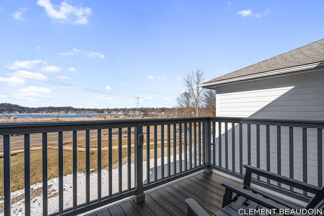 deck featuring a water view