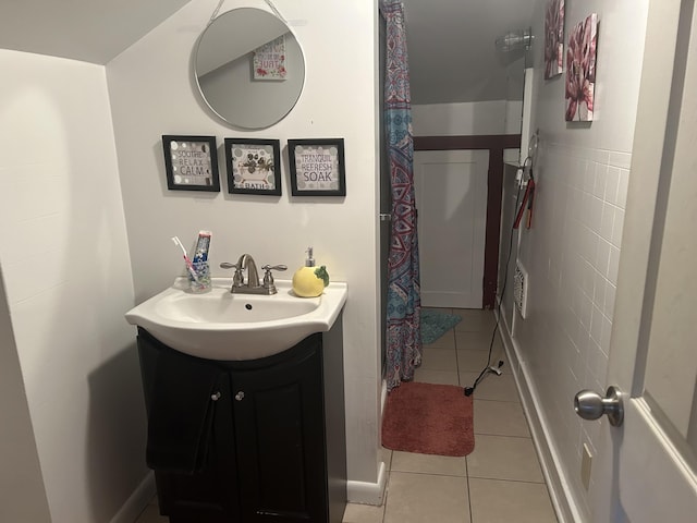 full bath featuring tile patterned flooring and vanity