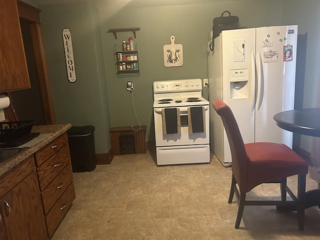 kitchen featuring white appliances