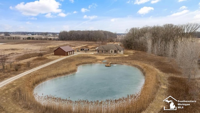 birds eye view of property featuring a rural view