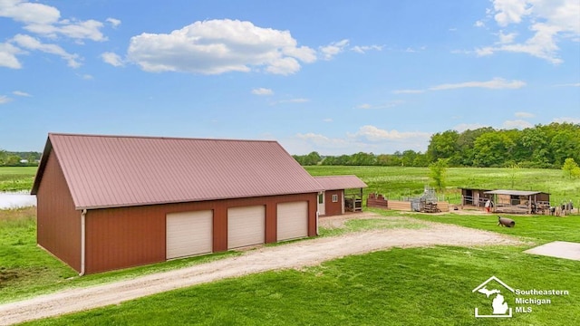 6370 Lewis Ave, Ida, MI 48140 - detached garage featuring a view of rural / pastoral area