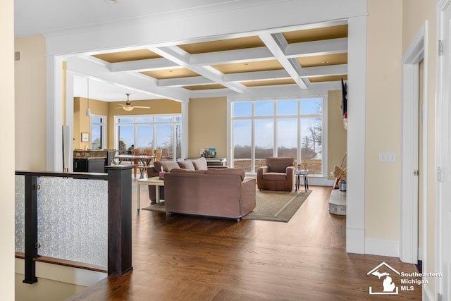 6370 Lewis Ave, Ida, MI 48140 - living room featuring coffered ceiling, a ceiling fan, beam ceiling, healthy amount of natural light, and dark wood-style flooring