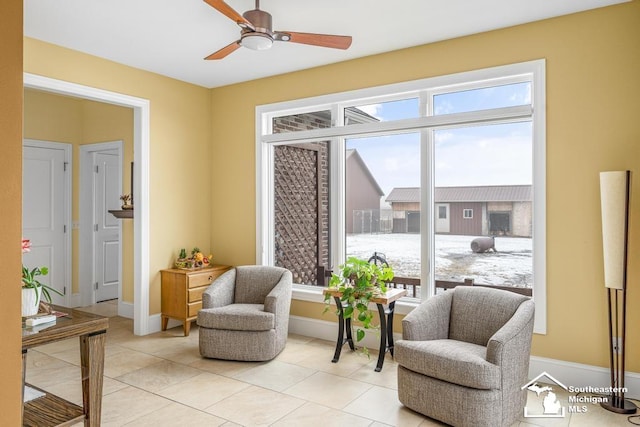 6370 Lewis Ave, Ida, MI 48140 - living area featuring ceiling fan, light tile patterned flooring, and baseboards