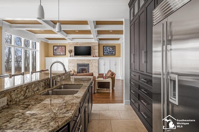 6370 Lewis Ave, Ida, MI 48140 - kitchen featuring stainless steel built in fridge, a sink, dark stone countertops, beam ceiling, and glass insert cabinets