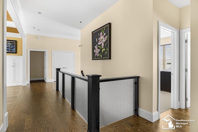 6370 Lewis Ave, Ida, MI 48140 - hall with dark wood finished floors, an upstairs landing, and baseboards