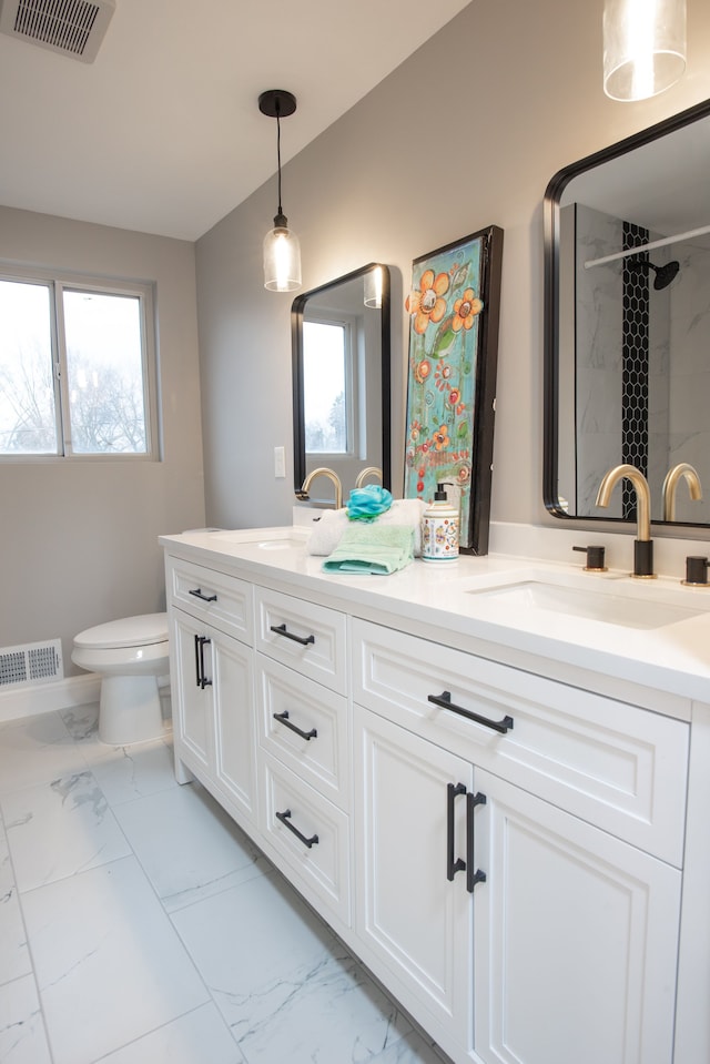 full bathroom with visible vents, marble finish floor, toilet, and a sink