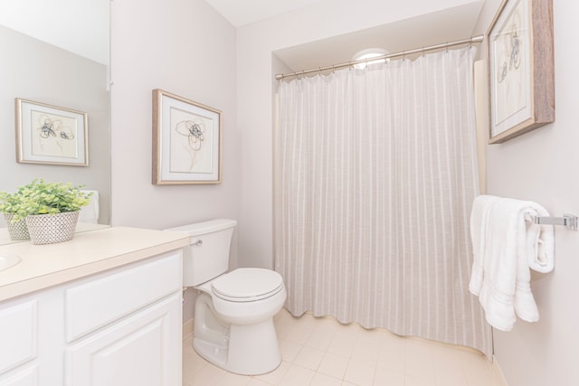 bathroom featuring curtained shower, toilet, and vanity